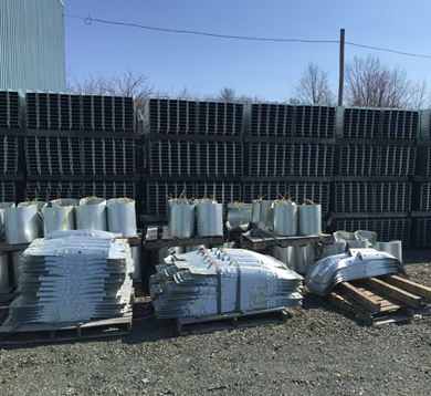 Accessories for highway guardrails - extremity plates, flex beam anchors and tubes